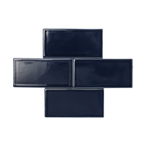 As impactful as the night sky, this standout blue glaze features warm undertones, a slight windowpane transparency around edges and relief details and a smooth reflective high-gloss surface texture.