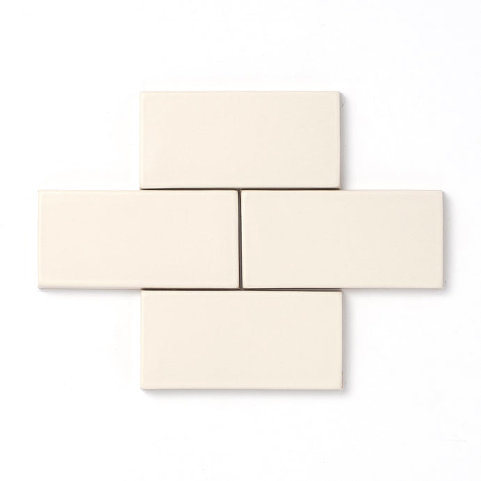 This perfect neutral is one that lives up to its name - offering a smooth matte surface texture, consistent color and an opaque break along tile edges and relief details. 