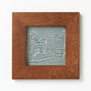 Decorative ceramic tile in blue glaze of Cincinnati Coney Island in Golden Oak Frame