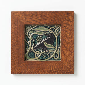 Rookwood Pottery Revival Bird Rook tile in golden oak frame.