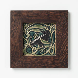 Rookwood Pottery Revival Bird Rook tile in walnut frame.
