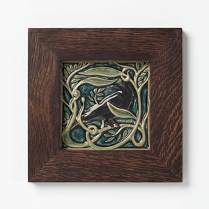 Rookwood Pottery Revival Bird Rook tile in walnut frame.