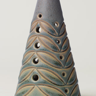 Close-up details of hand-thrown ceramic holiday tree