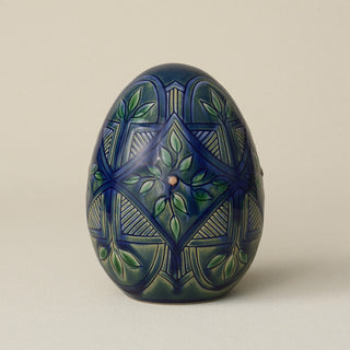 Handcrafted ceramic egg by Rookwood Pottery