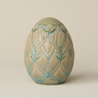 Handcrafted ceramic egg by Rookwood Pottery
