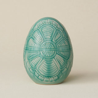 Handcrafted ceramic egg by Rookwood Pottery
