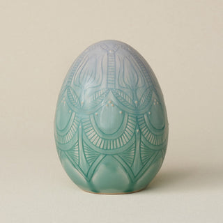 Handcrafted ceramic egg by Rookwood Pottery