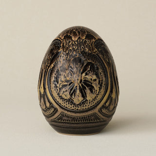 Handcrafted ceramic egg by Rookwood Pottery