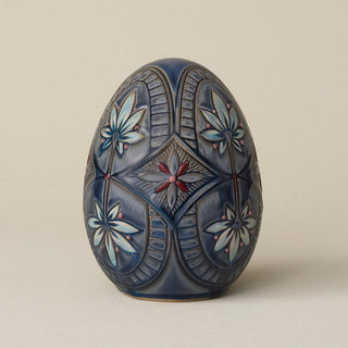 Handcrafted ceramic egg by Rookwood Pottery