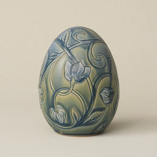 Handcrafted ceramic egg by Rookwood Pottery