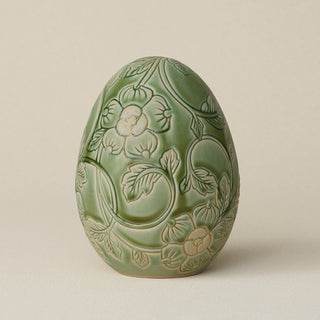 Handcrafted ceramic egg by Rookwood Pottery