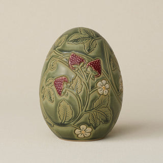 Handcrafted ceramic egg by Rookwood Pottery