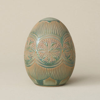 Handcrafted ceramic egg by Rookwood Pottery
