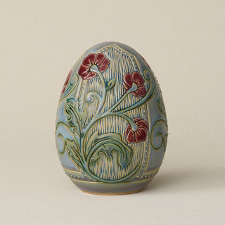 Handcrafted ceramic egg by Rookwood Pottery