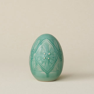 Handcrafted ceramic egg by Rookwood Pottery