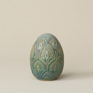 Handcrafted ceramic egg by Rookwood Pottery