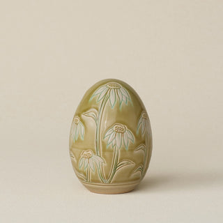Handcrafted ceramic egg by Rookwood Pottery