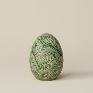 Handcrafted ceramic egg by Rookwood Pottery