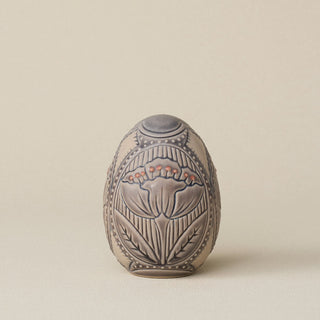 Handcrafted ceramic egg by Rookwood Pottery