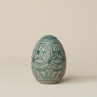 Handcrafted ceramic egg by Rookwood Pottery