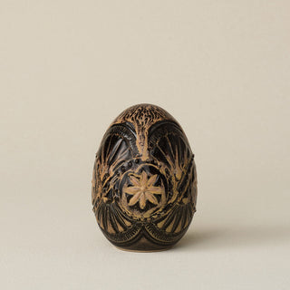 Handcrafted ceramic egg by Rookwood Pottery