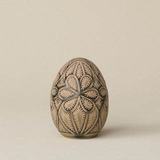 Handcrafted ceramic egg by Rookwood Pottery