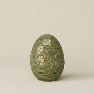 Handcrafted ceramic egg by Rookwood Pottery