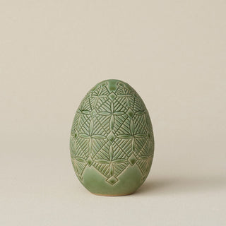 Handcrafted ceramic egg by Rookwood Pottery