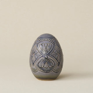 Handcrafted ceramic egg by Rookwood Pottery