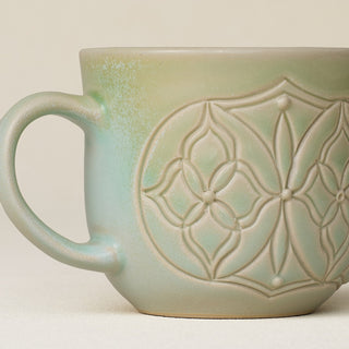 Close-up details of hand-thrown mug by Rookwood