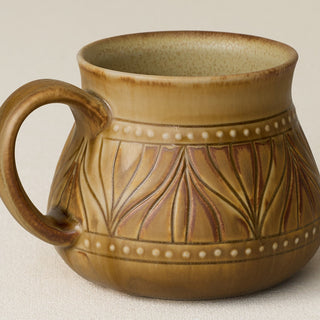 Close-up details of hand-thrown mug by Rookwood
