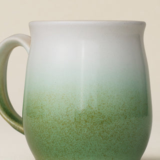 Close-up details of hand-thrown mug by Rookwood