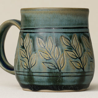 Close-up details of hand-thrown mug by Rookwood