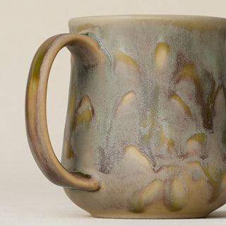 Close-up details of hand-thrown mug by Rookwood