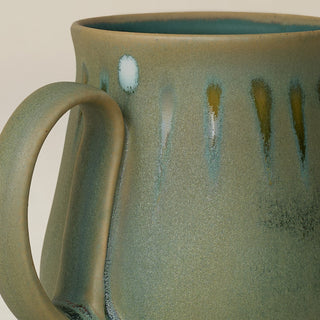 Close-up details of hand-thrown mug by Rookwood