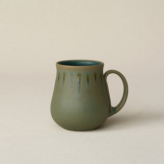 Hand-thrown ceramic mug by Rookwood Pottery