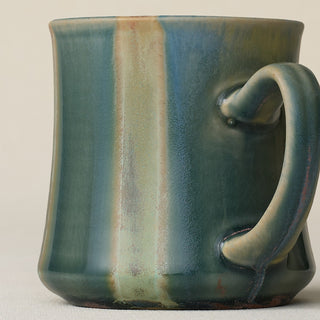 Close-up details of hand-thrown mug by Rookwood
