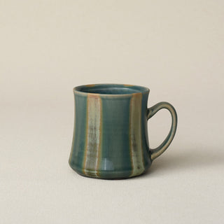 Hand-thrown ceramic mug by Rookwood Pottery