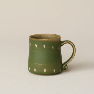 Hand-thrown ceramic mug by Rookwood Pottery