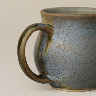 Close-up details of hand-thrown mug by Rookwood