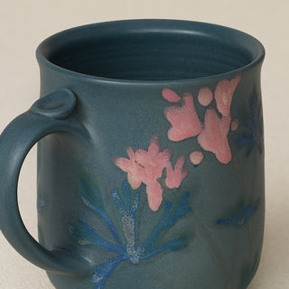 Close-up details of hand-thrown mug by Rookwood