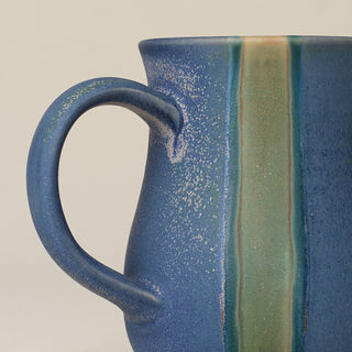 Close-up details of hand-thrown mug by Rookwood