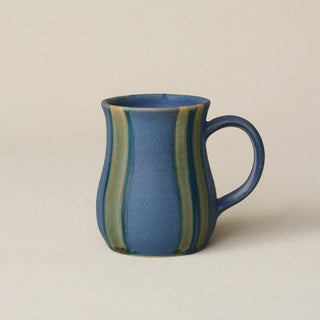 Hand-thrown ceramic mug by Rookwood Pottery