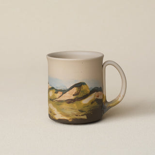Hand-thrown ceramic mug by Rookwood Pottery