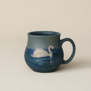 Hand-thrown ceramic mug by Rookwood Pottery