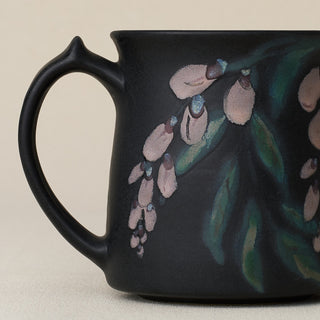 Close-up details of hand-thrown mug by Rookwood