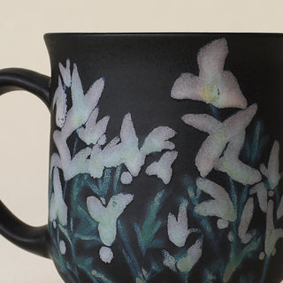 Close-up details of hand-thrown mug by Rookwood