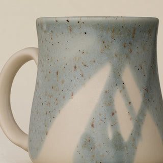 Close-up details of hand-thrown mug by Rookwood