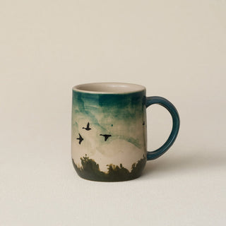 Hand-thrown ceramic mug by Rookwood Pottery