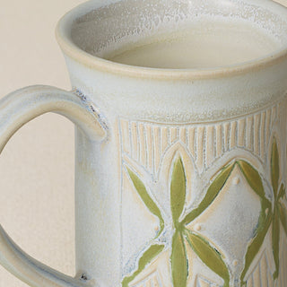 Close-up details of hand-thrown mug by Rookwood